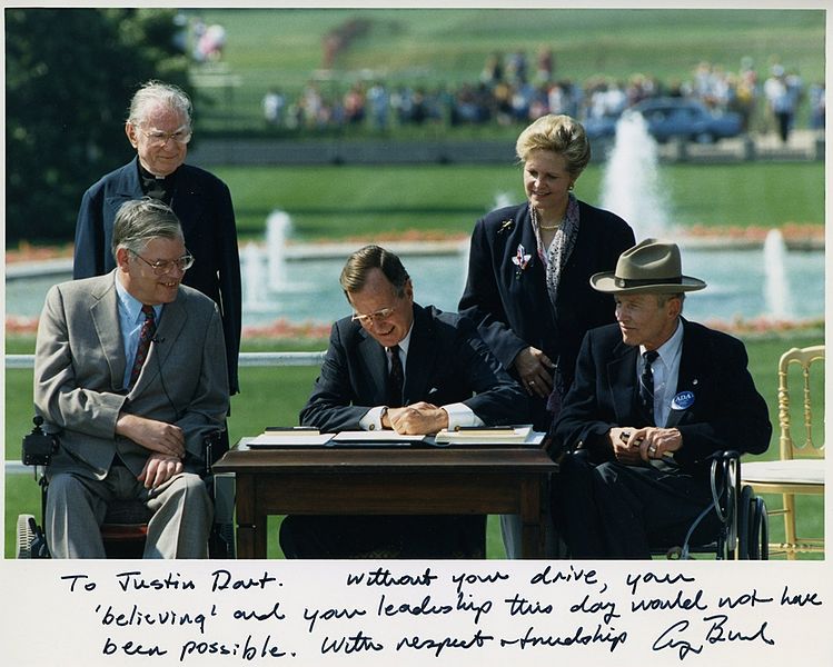 058-si_George_H_W_Bush_signing_ADA_inscribed_to_Justin_Dart_Jr.jpg