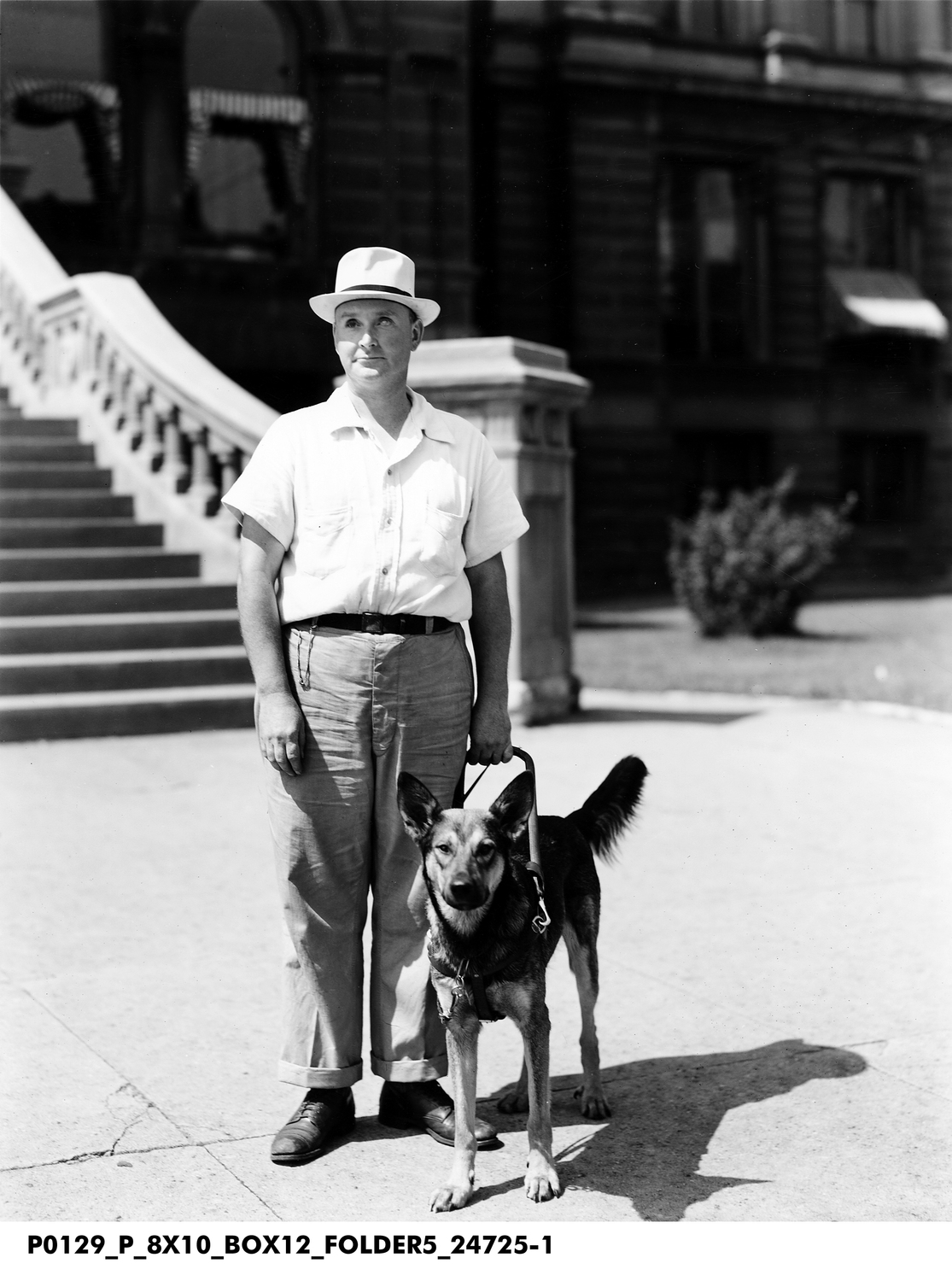 068-si_ Man_with_a_Guide_Dog.jpg